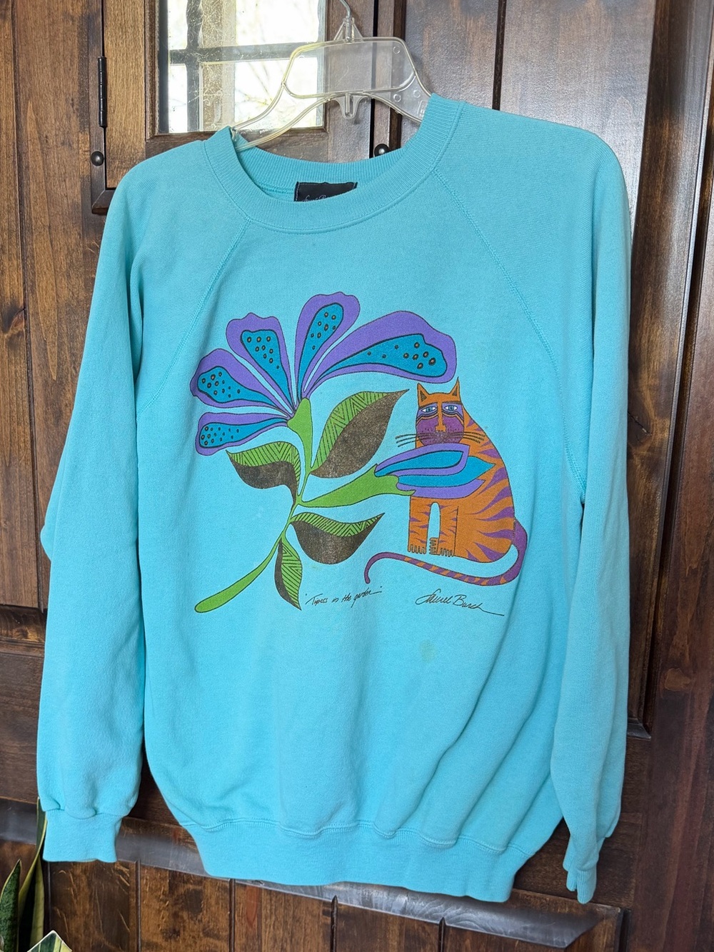 Bright Teal Sweatshirt with Colorful Cat & Floral Graphic